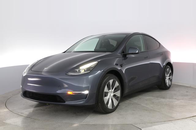 2023 Tesla Model Y — VIN 7SAYGDEE8PF699421