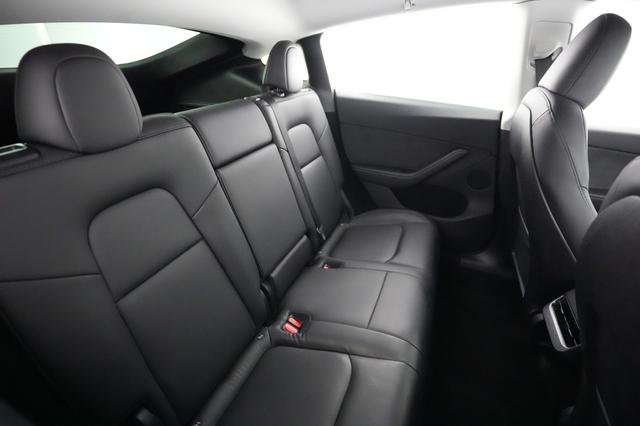 2023 Tesla Model Y — photo 4 of 21