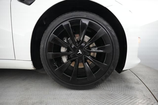 2022 Tesla Model 3 — photo 7 of 23