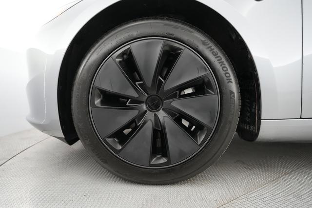 2025 Tesla Model 3 — photo 7 of 24