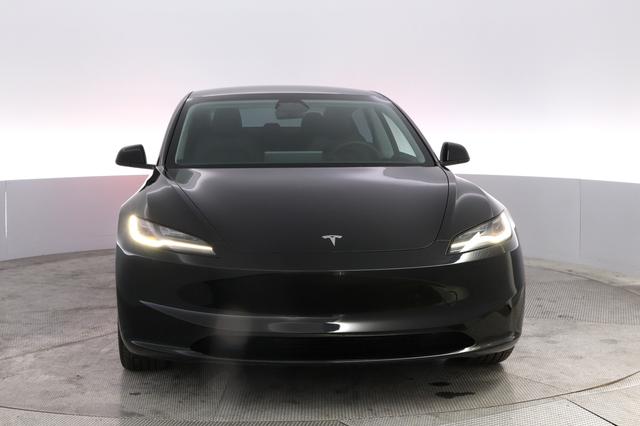 2025 Tesla Model 3 — photo 9 of 23