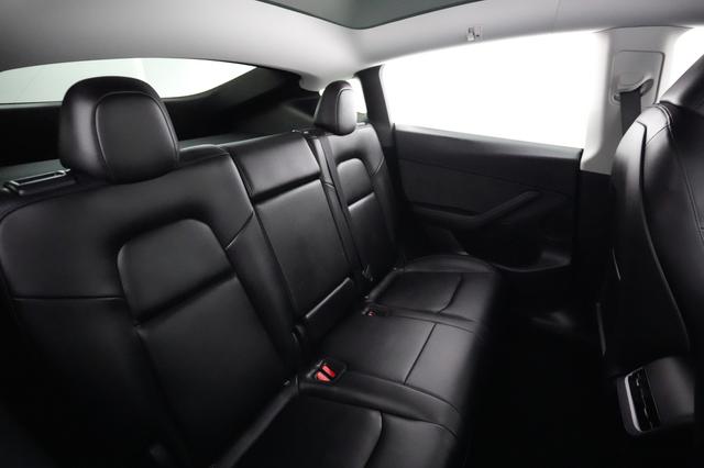 2024 Tesla Model Y — photo 4 of 21