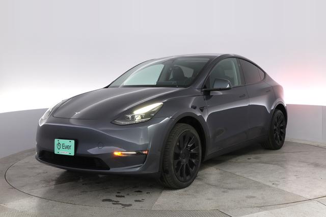 2023 Tesla Model Y — VIN 7SAYGDEE2PF828141