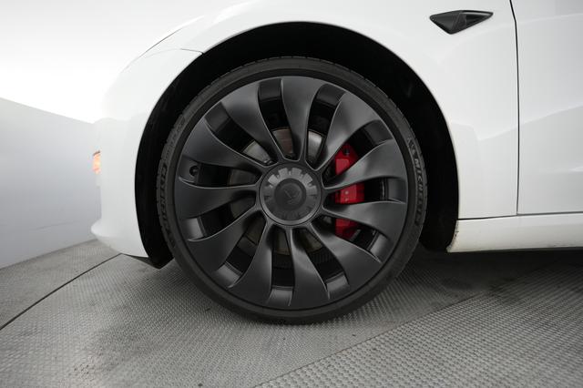 2023 Tesla Model 3 — photo 7 of 21