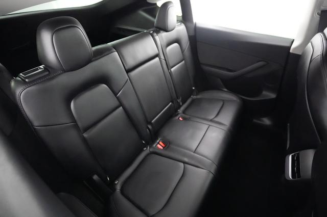 2025 Tesla Model Y — photo 4 of 21