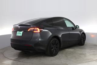2025 Tesla Model Y — photo 2 of 21