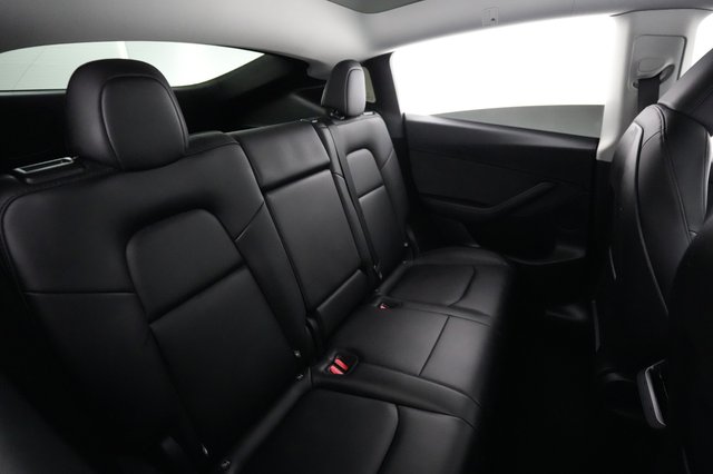 2025 Tesla Model Y — photo 4 of 21
