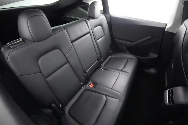 2025 Tesla Model Y — photo 4 of 21