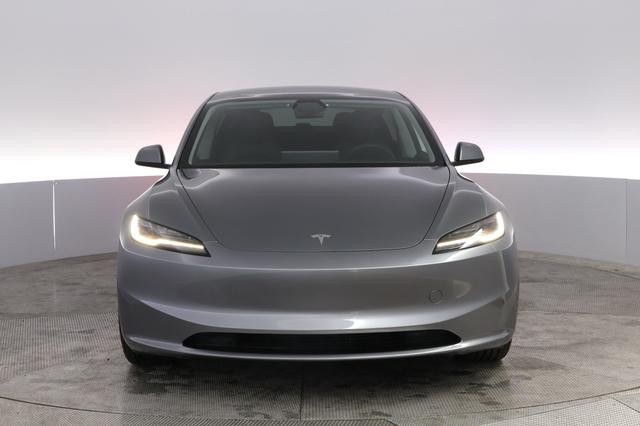 2025 Tesla Model 3 — photo 9 of 21