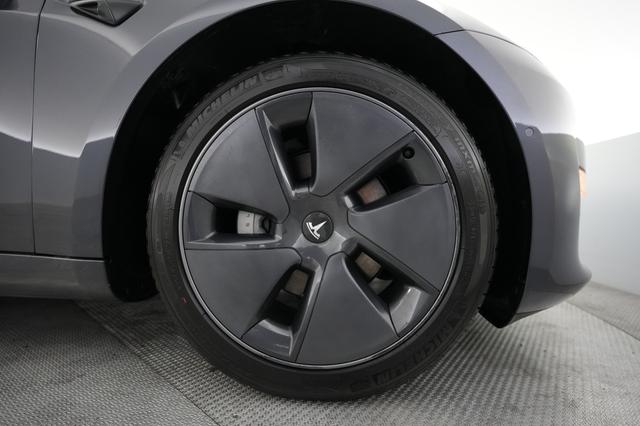 2022 Tesla Model 3 — photo 7 of 21