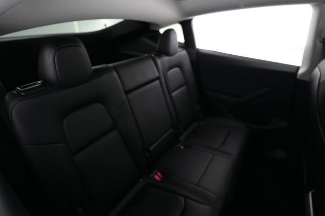 2024 Tesla Model Y — photo 4 of 21