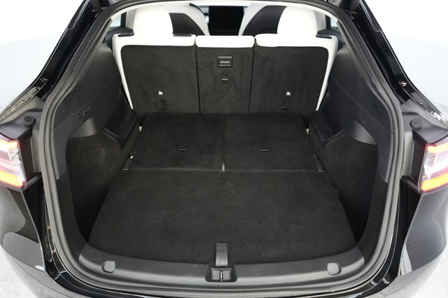 2025 Tesla Model Y — photo 6 of 22