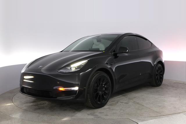 2025 Tesla Model Y — VIN 7SAYGAEE4SF218734