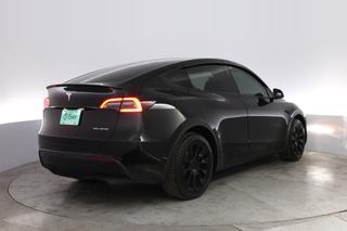 2025 Tesla Model Y — photo 2 of 22