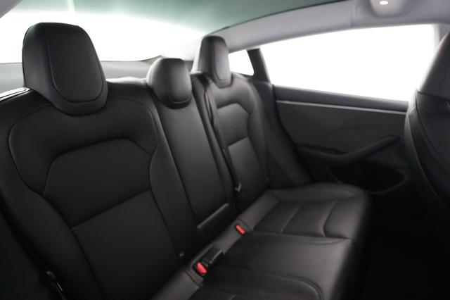 2025 Tesla Model 3 — photo 4 of 24