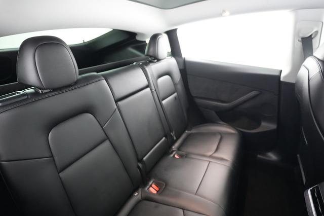 2023 Tesla Model Y — photo 4 of 21
