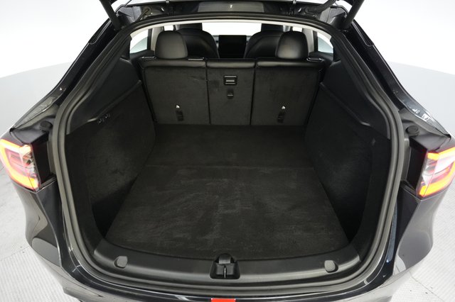 2025 Tesla Model Y — photo 6 of 21