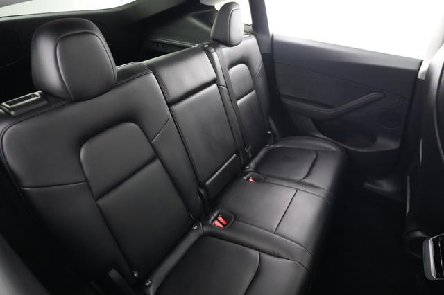2025 Tesla Model Y — photo 4 of 21