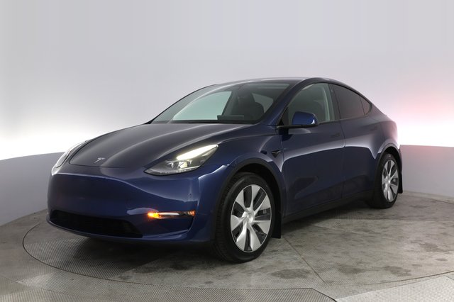 2023 Tesla Model Y — VIN 7SAYGAEE1PF774409