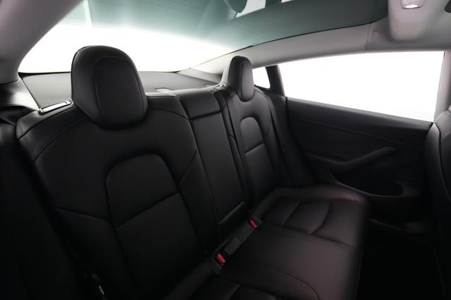 2023 Tesla Model 3 — photo 4 of 22
