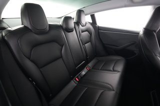 2025 Tesla Model 3 — photo 4 of 21