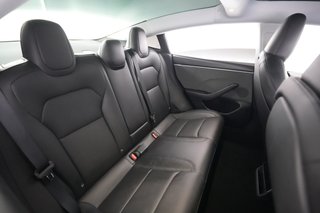 2025 Tesla Model 3 — photo 4 of 21
