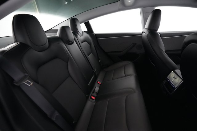 2025 Tesla Model 3 — photo 4 of 21