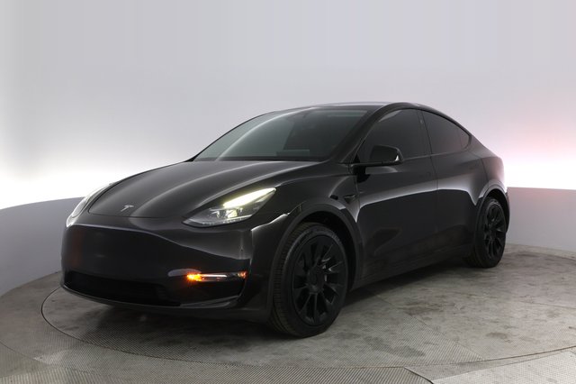 2024 Tesla Model Y — VIN 7SAYGAEE1RF205126
