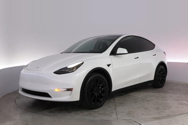 2023 Tesla Model Y — VIN 7SAYGDEE1PA119309