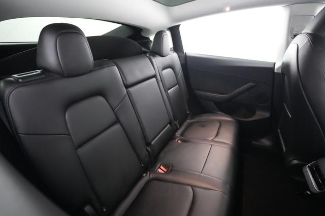 2025 Tesla Model Y — photo 4 of 24