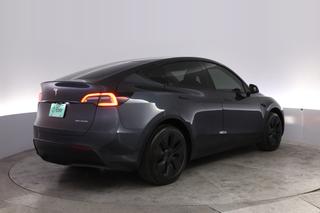 2025 Tesla Model Y — photo 2 of 21