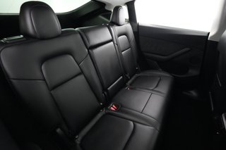 2025 Tesla Model Y — photo 4 of 21