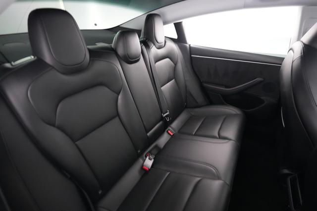 2025 Tesla Model 3 — photo 4 of 21