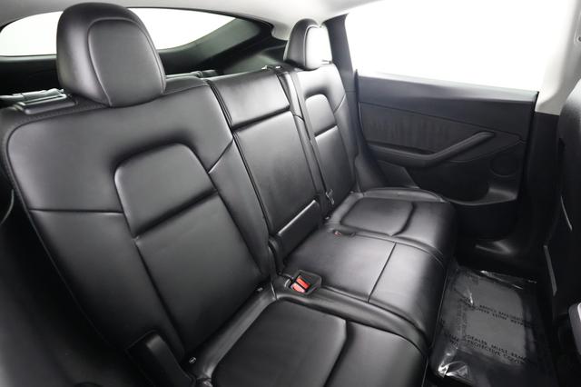 2023 Tesla Model Y — photo 4 of 24