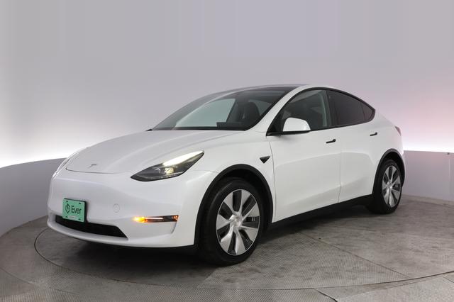 2023 Tesla Model Y — VIN 7SAYGAEEXPF742381