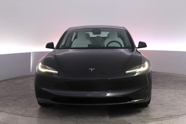 2025 Tesla Model 3 — photo 9 of 21