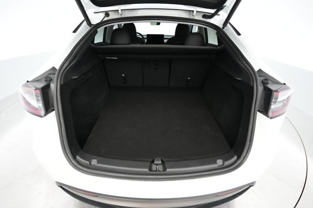 2023 Tesla Model Y — photo 6 of 21
