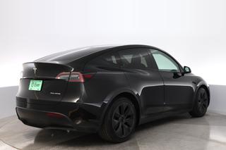 2025 Tesla Model Y — photo 2 of 26