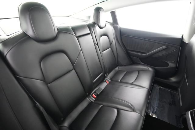 2023 Tesla Model 3 — photo 4 of 24