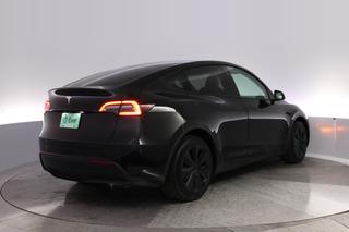 2025 Tesla Model Y — photo 2 of 24