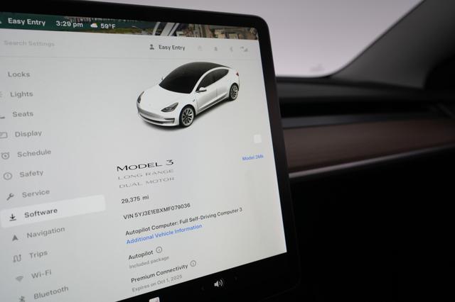 2021 Tesla Model 3 — photo 4 of 35