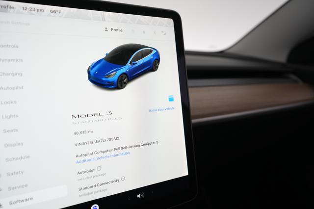 2020 Tesla Model 3 — photo 4 of 61